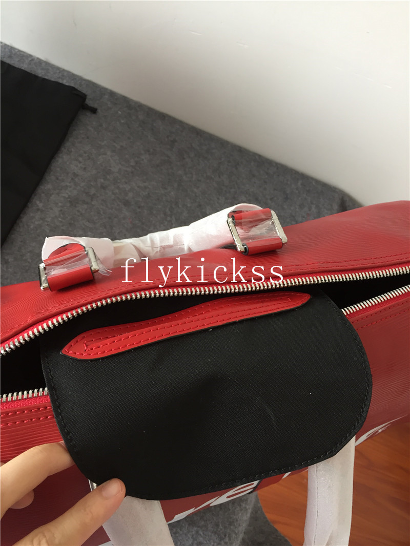 Supreme LVS Traveling Red Duffle Bag